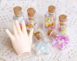 miniature jelly bean bottles with Minifee hand