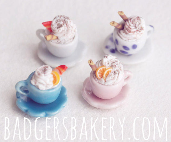 miniature coffee cups (white, patterned white, blue, pink)